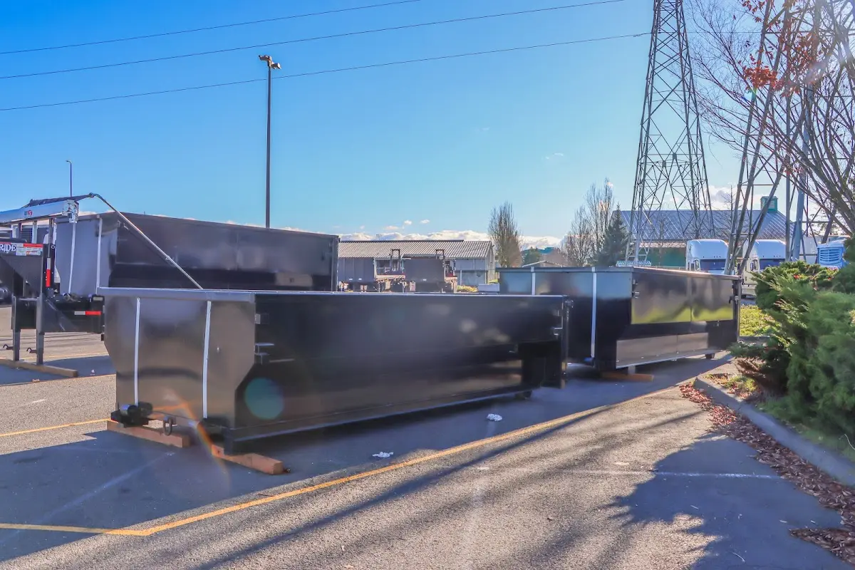 Roll-off dumpster ready for waste disposal at job site for Roofing Dumpster Rental in Jenks